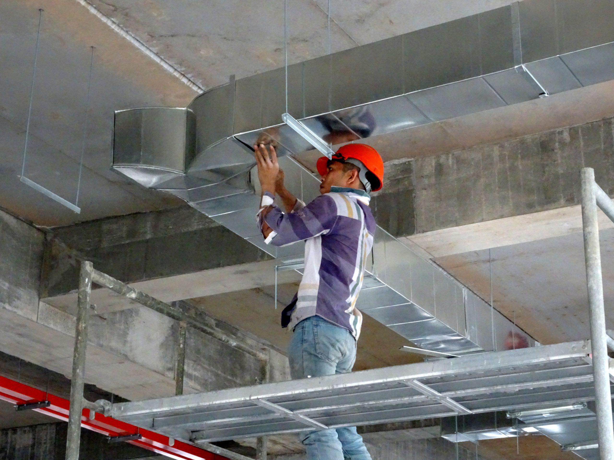 HVAC Technician Working